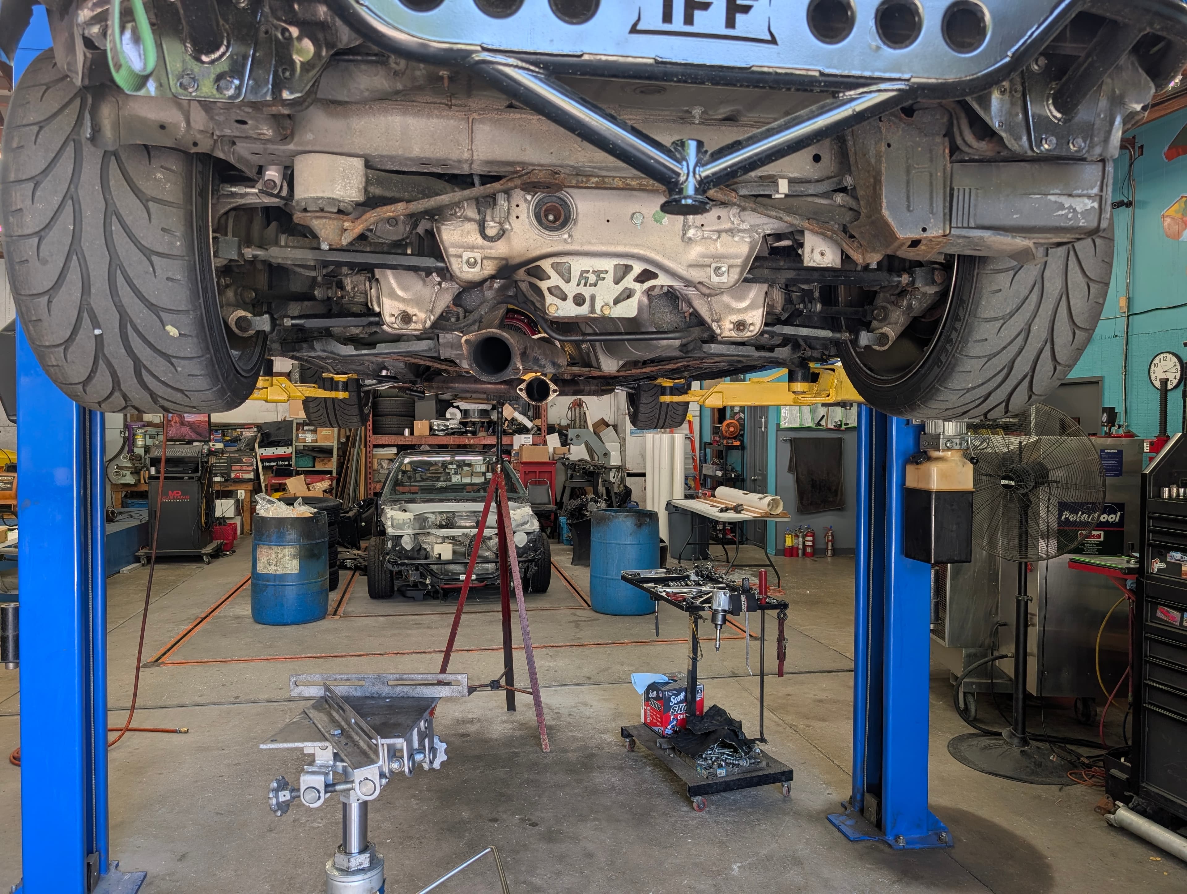 Shop floor with car on the lift